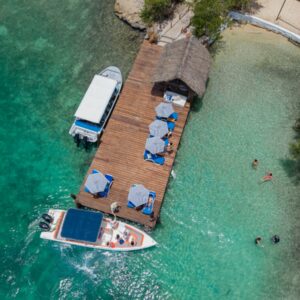 Aerial view of Coralina Island dock and bayside beach in Rosario Islands near Cartagena