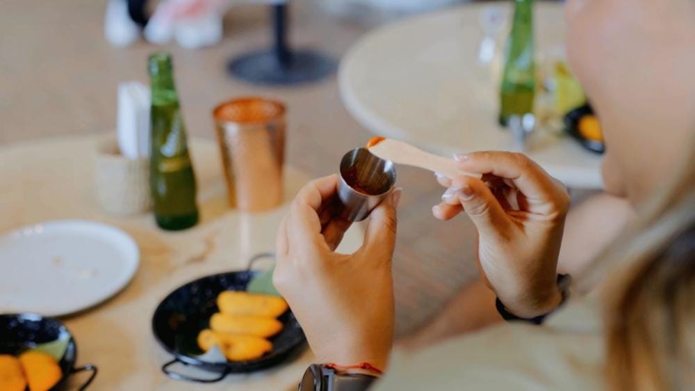 "Tasting Colombian fried food during a workshop in Cartagena