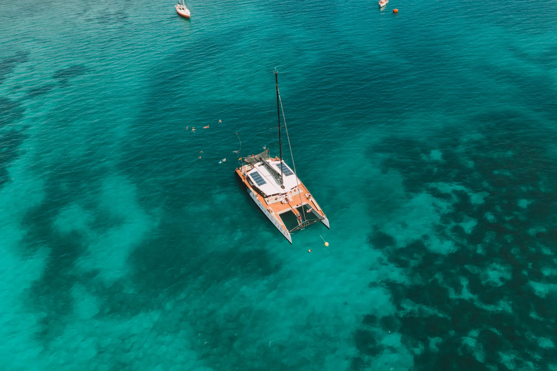 Rosario Islands catamaran tour Cartagena beach clear water Caribbean